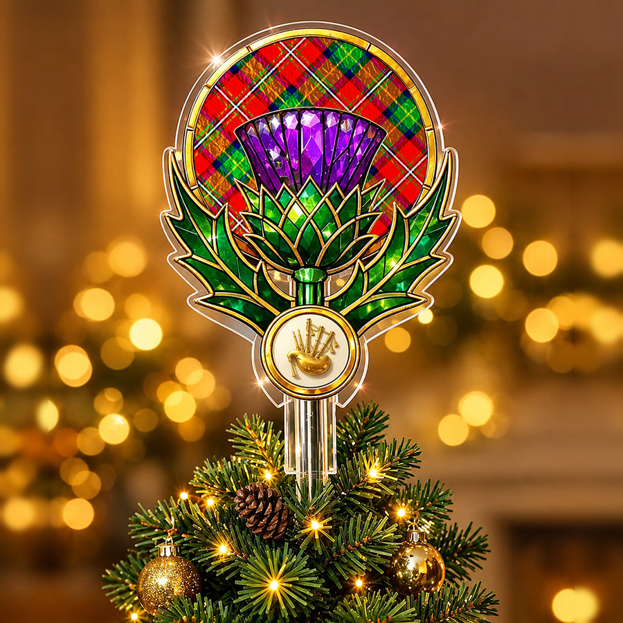 Stained-glass style thistle Christmas tree topper with a gold bagpipe emblem and the Boyd Modern tartan behind the thistle