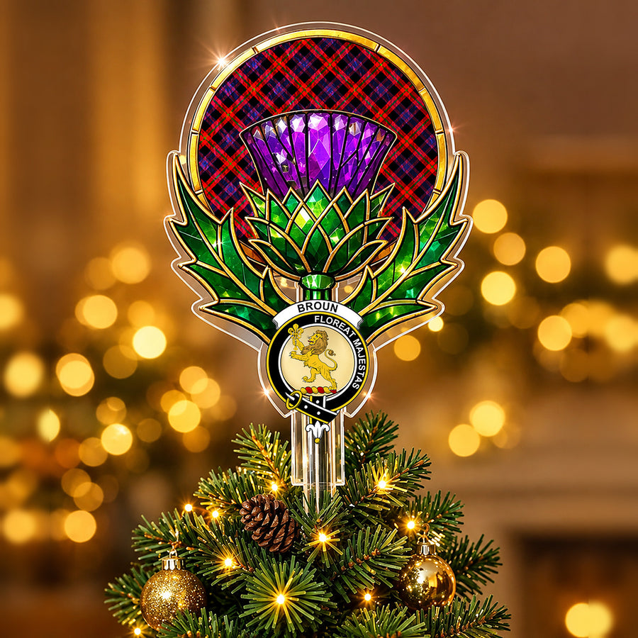Clan Broun crest in the centre of a stained-glass style thistle Christmas tree topper with the Broun tartan behind the thistle