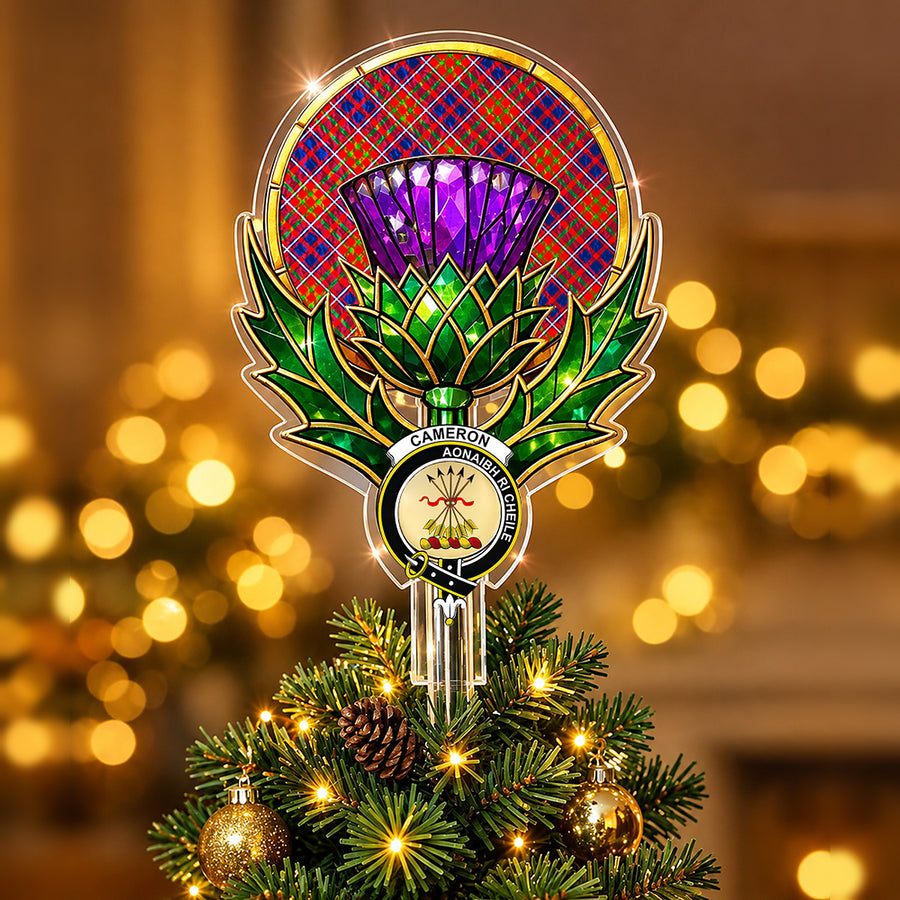 Clan Cameron crest in the centre of a stained-glass style thistle Christmas tree topper with the Cameron of Lochiel tartan behind the thistle