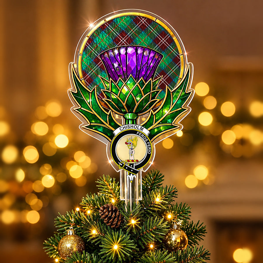Clan Chisholm crest in the centre of a stained-glass style thistle Christmas tree topper with the Chisholm Hunting Ancient tartan behind the thistle