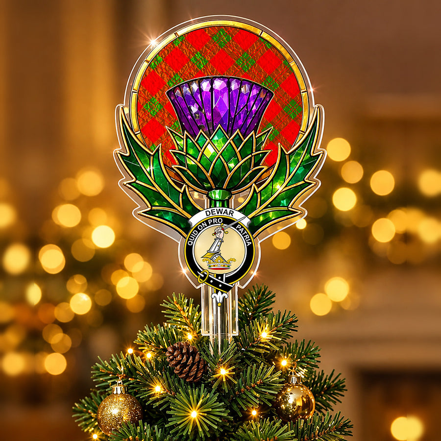 Clan Dewar crest in the centre of a stained-glass style thistle Christmas tree topper with the Dewar tartan behind the thistle