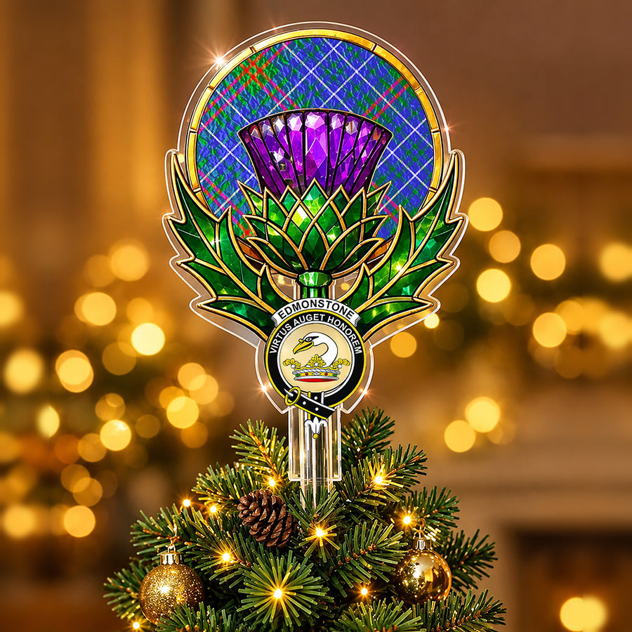 Clan Edmonstone crest in the centre of a stained-glass style thistle Christmas tree topper with the Edmonstone tartan behind the thistle