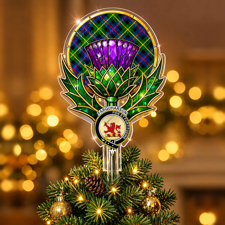 Clan Farquharson crest in the centre of a stained-glass style thistle Christmas tree topper with the Farquharson Modern tartan behind the thistle