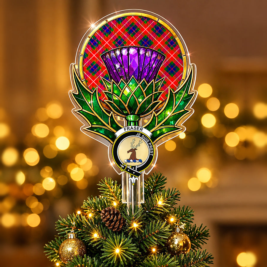 Clan Fraser crest in the centre of a stained-glass style thistle Christmas tree topper with the Fraser Lovat Modern tartan behind the thistle