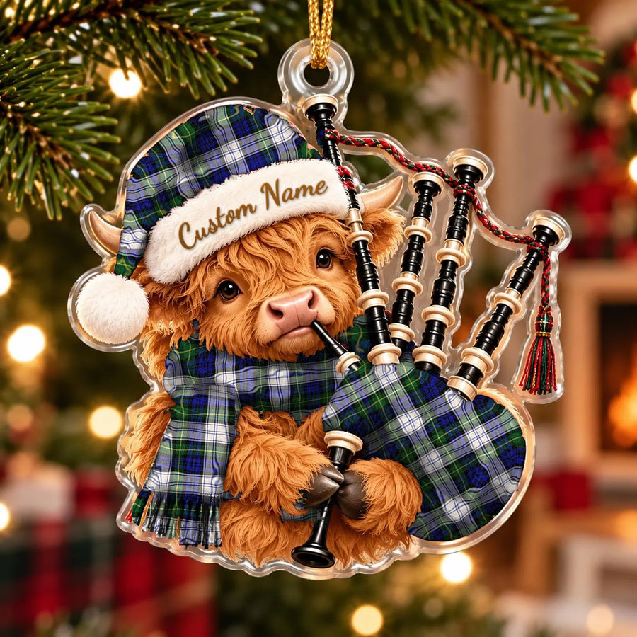 Acrylic Highland cow calf ornament playing the bagpipes, in a Gordon Dress Modern tartan Santa hat, scarf and pipe bag, with a custom name on the hat