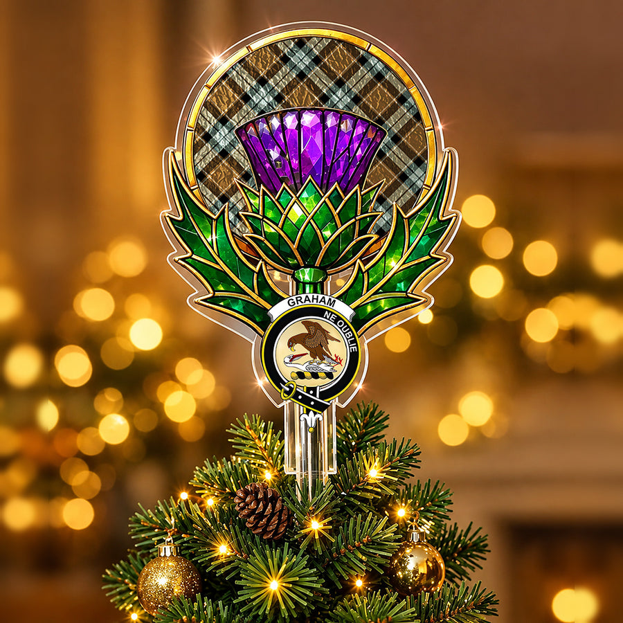 Clan Graham crest in the centre of a stained-glass style thistle Christmas tree topper with the Graham of Menteith Weathered tartan behind the thistle