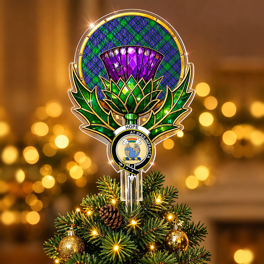Clan Hope crest in the centre of a stained-glass style thistle Christmas tree topper with the Hope tartan behind the thistle