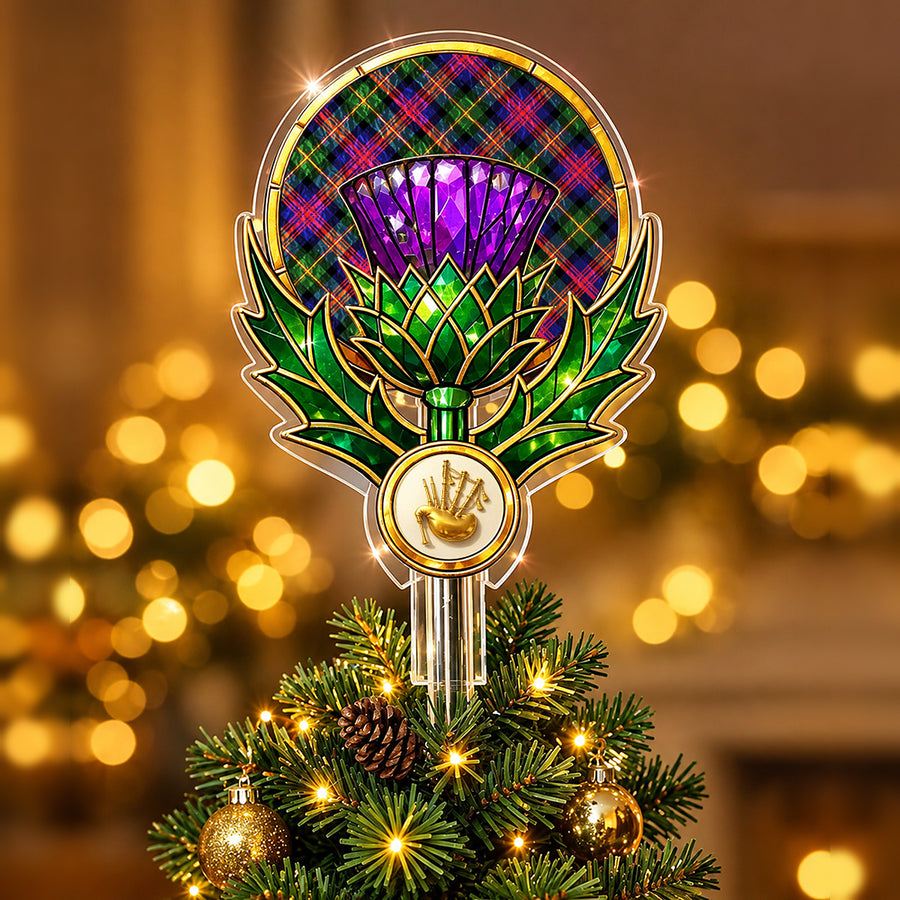 Stained-glass style thistle Christmas tree topper with a gold bagpipe emblem and the MacLennan tartan behind the thistle