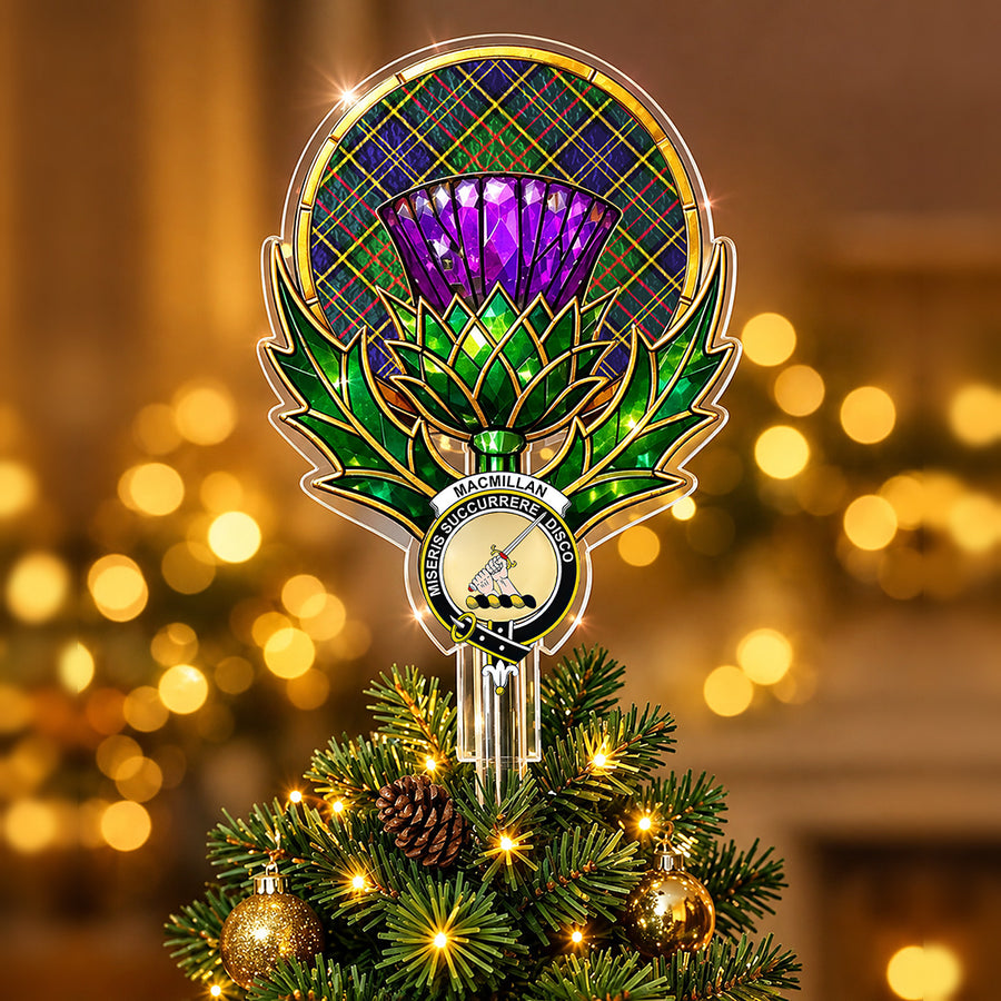Clan MacMillan crest in the centre of a stained-glass style thistle Christmas tree topper with the MacMillan Hunting Modern tartan behind the thistle
