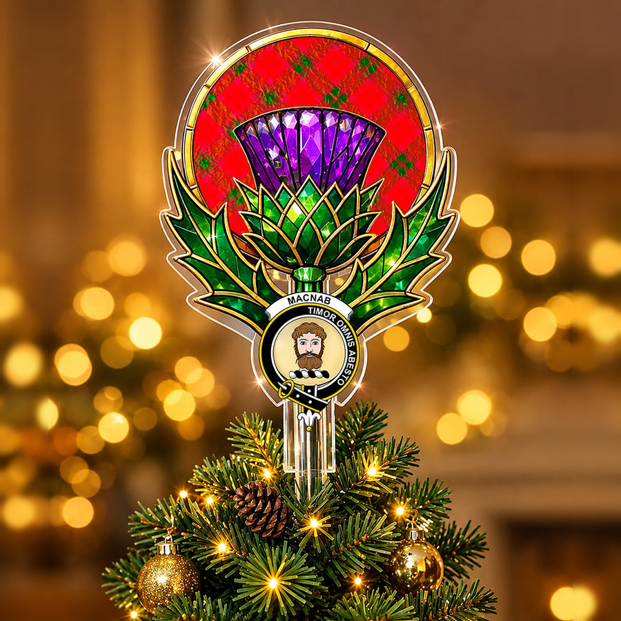 Clan MacNab crest in the centre of a stained-glass style thistle Christmas tree topper with the MacNab Modern tartan behind the thistle