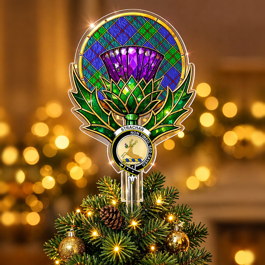 Clan Strachan crest in the centre of a stained-glass style thistle Christmas tree topper with the Strachan tartan behind the thistle