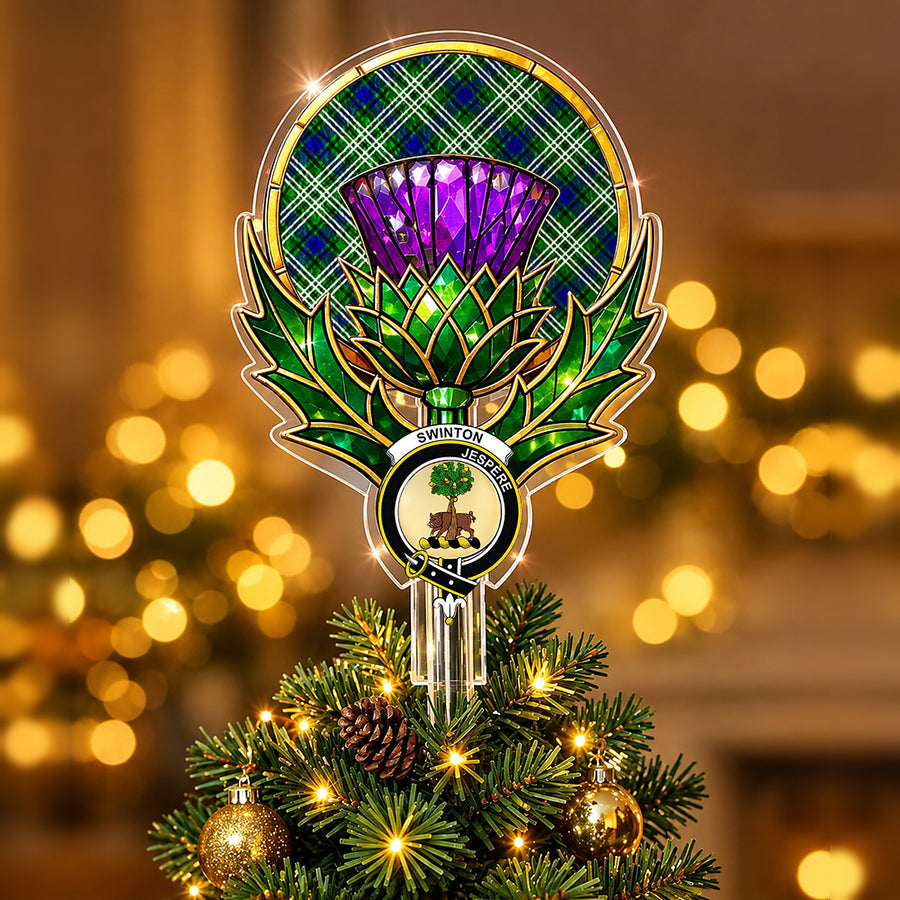 Clan Swinton crest in the centre of a stained-glass style thistle Christmas tree topper with the Swinton (Tweedside) tartan behind the thistle