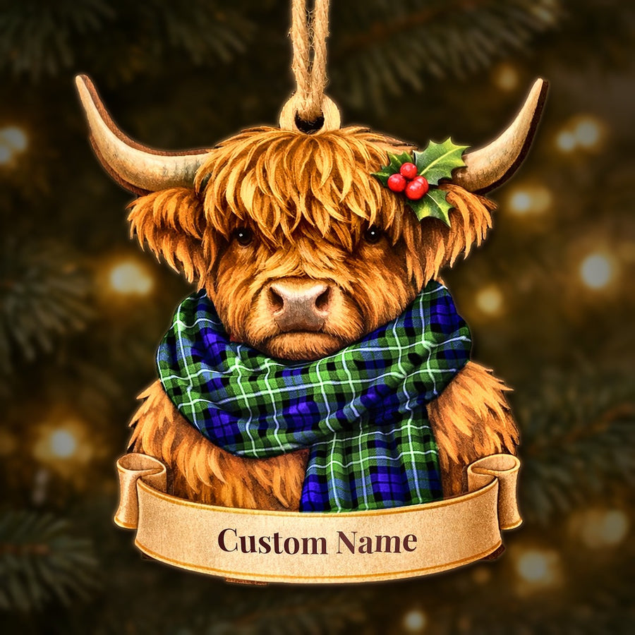 Wooden Highland cow Christmas ornament wearing a Allardice tartan scarf, with a ribbon banner for a custom name