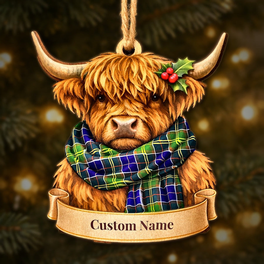 Wooden Highland cow Christmas ornament wearing a Arnott tartan scarf, with a ribbon banner for a custom name
