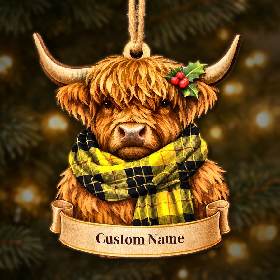 Wooden Highland cow Christmas ornament wearing a MacLeod of Lewis Ancient tartan scarf, with a ribbon banner for a custom name