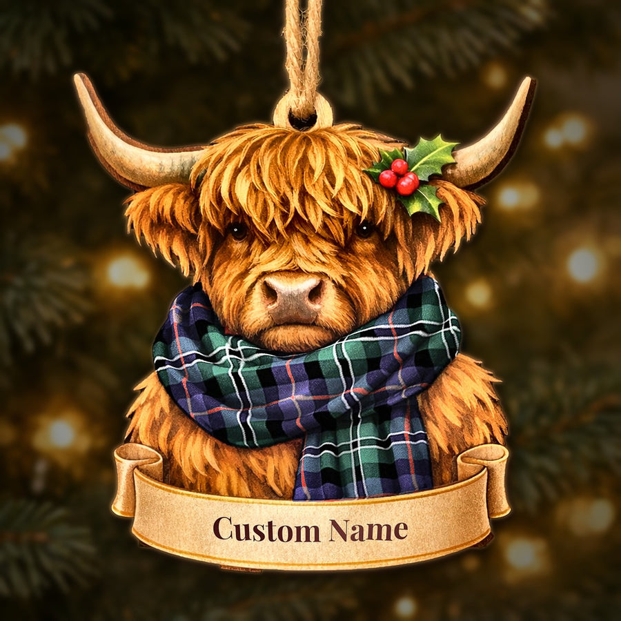 Wooden Highland cow Christmas ornament wearing a Rose Hunting Modern tartan scarf, with a ribbon banner for a custom name
