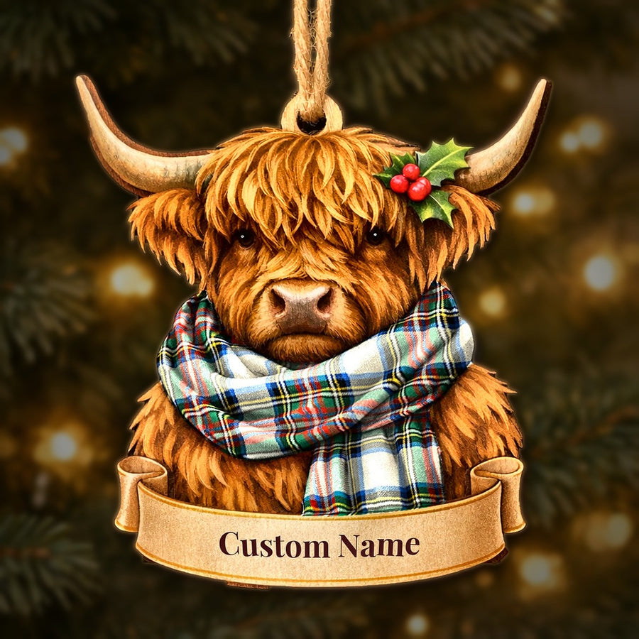 Wooden Highland cow Christmas ornament wearing a Stewart Dress Ancient tartan scarf, with a ribbon banner for a custom name