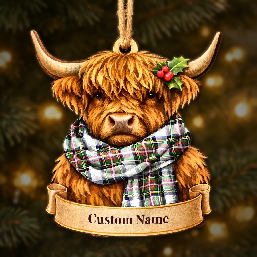 Wooden Highland cow Christmas ornament wearing a Stewart Dress Modern tartan scarf, with a ribbon banner for a custom name