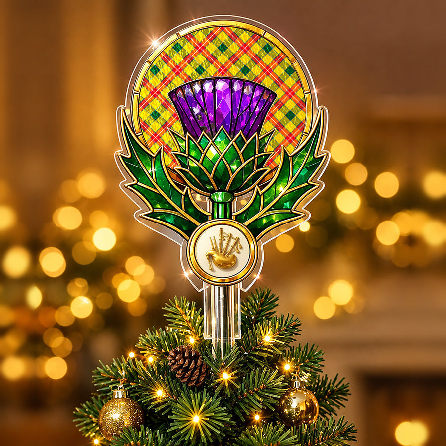 Stained-glass style thistle Christmas tree topper with a gold bagpipe emblem and the Baxter tartan behind the thistle