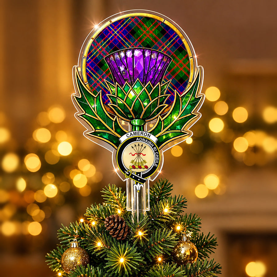 Clan Cameron crest in the centre of a stained-glass style thistle Christmas tree topper with the Cameron of Erracht Modern tartan behind the thistle