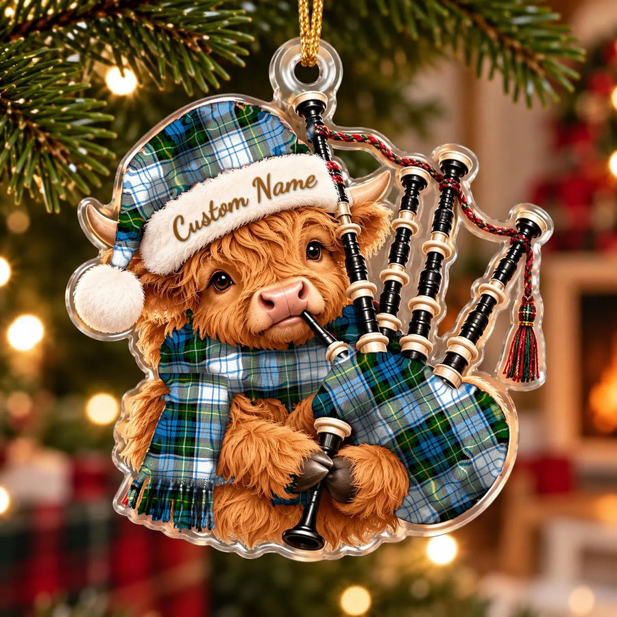 Acrylic Highland cow calf ornament playing the bagpipes, in a Campbell Dress tartan Santa hat, scarf and pipe bag, with a custom name on the hat