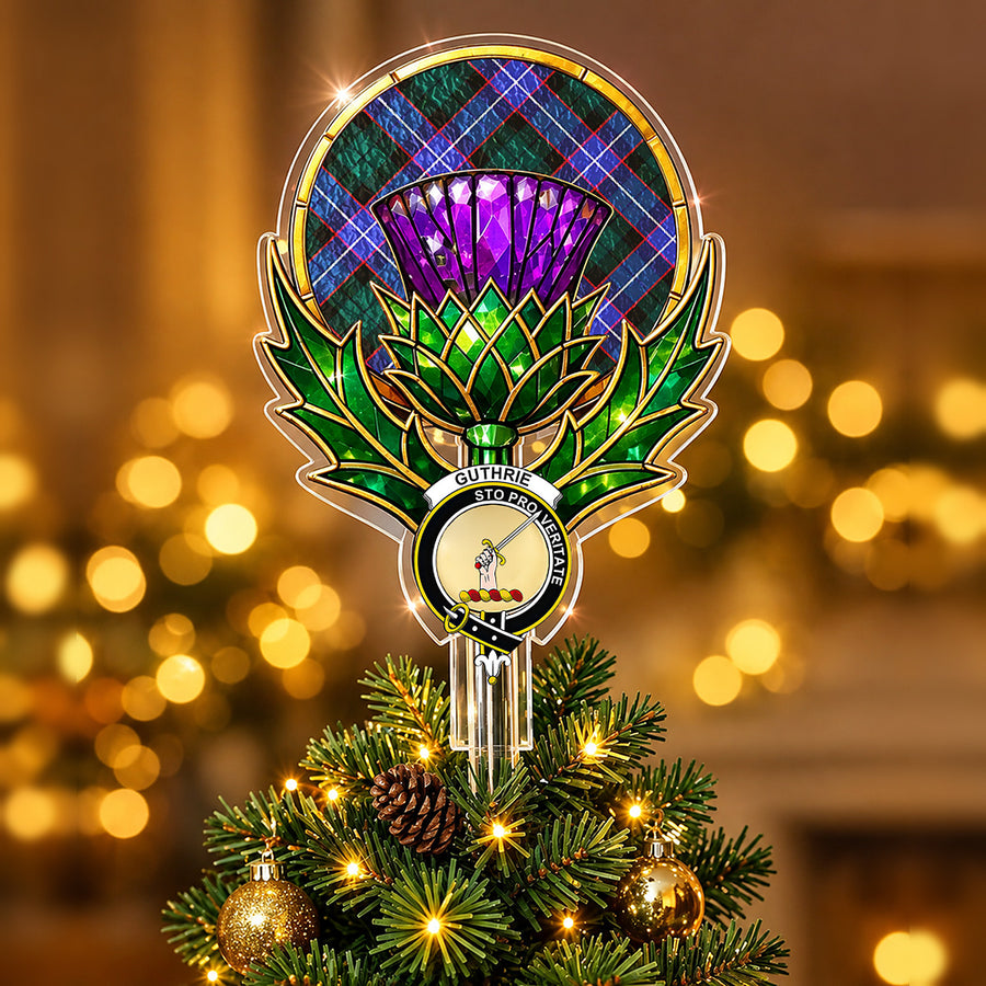 Clan Guthrie crest in the centre of a stained-glass style thistle Christmas tree topper with the Guthrie Modern tartan behind the thistle
