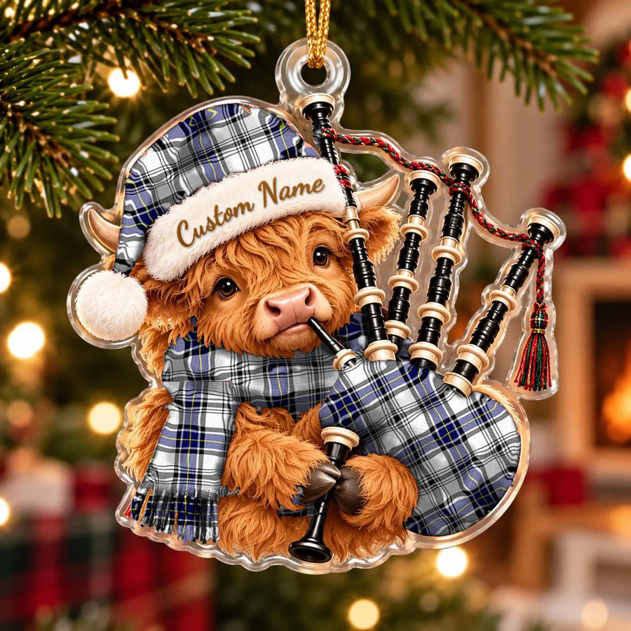 Acrylic Highland cow calf ornament playing the bagpipes, in a Hannay tartan Santa hat, scarf and pipe bag, with a custom name on the hat