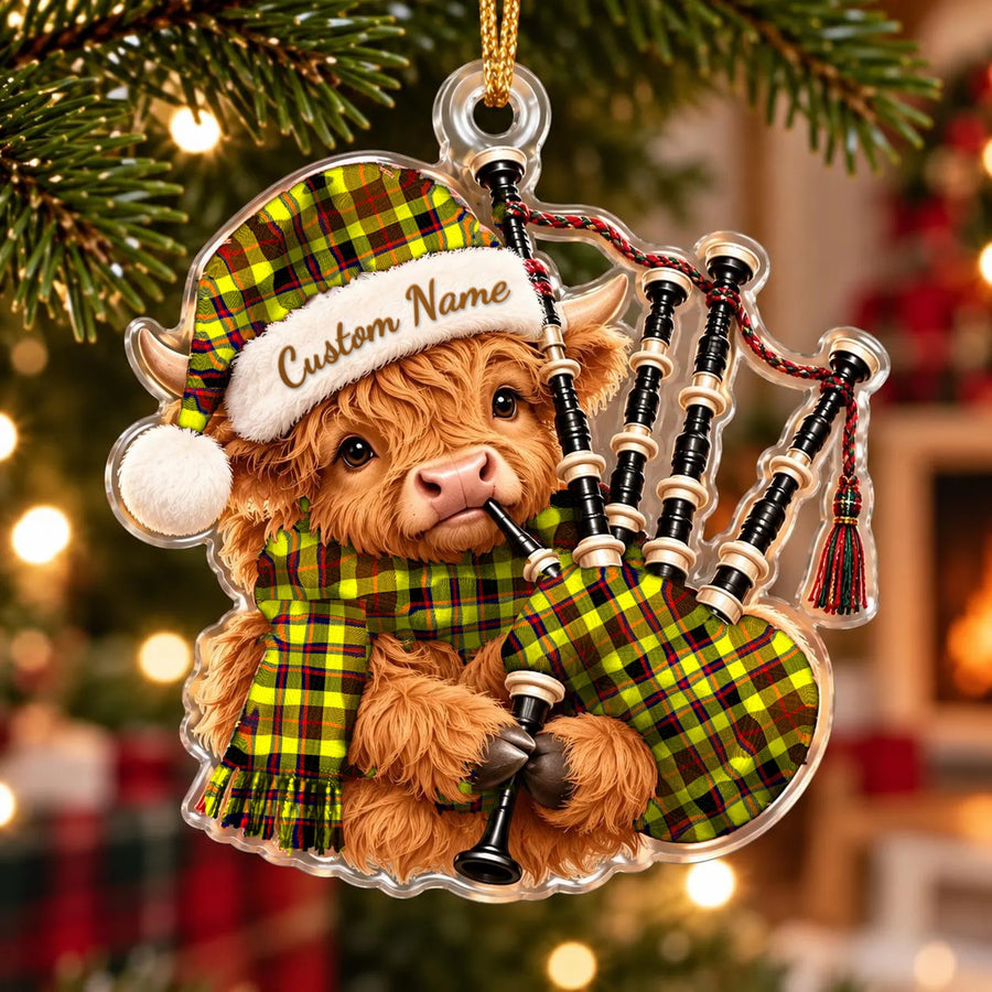 Acrylic Highland cow calf ornament playing the bagpipes, in a Jardine tartan Santa hat, scarf and pipe bag, with a custom name on the hat