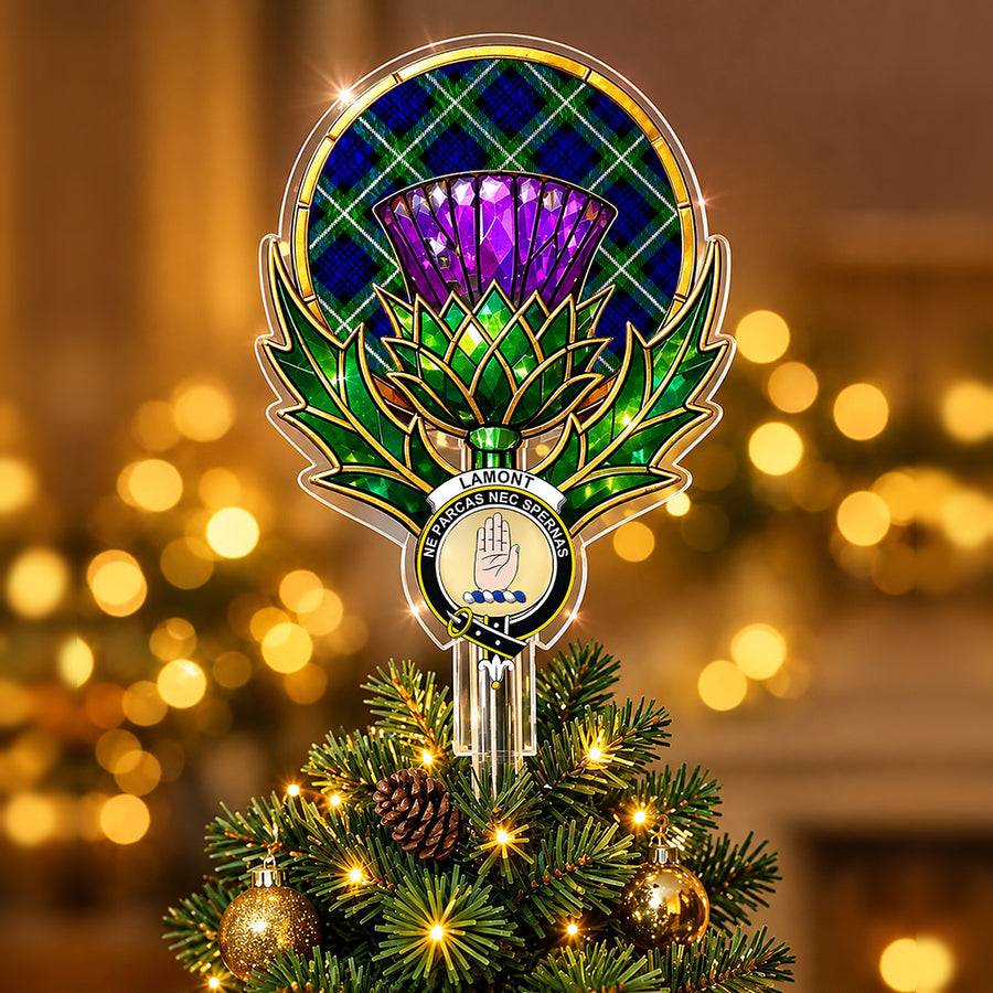Clan Lamont crest in the centre of a stained-glass style thistle Christmas tree topper with the Lamont Modern tartan behind the thistle