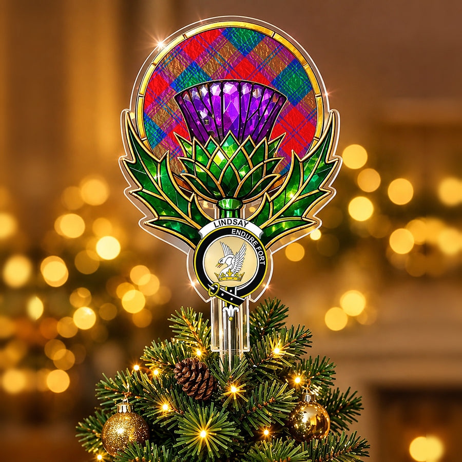 Clan Lindsay crest in the centre of a stained-glass style thistle Christmas tree topper with the Lindsay Modern tartan behind the thistle