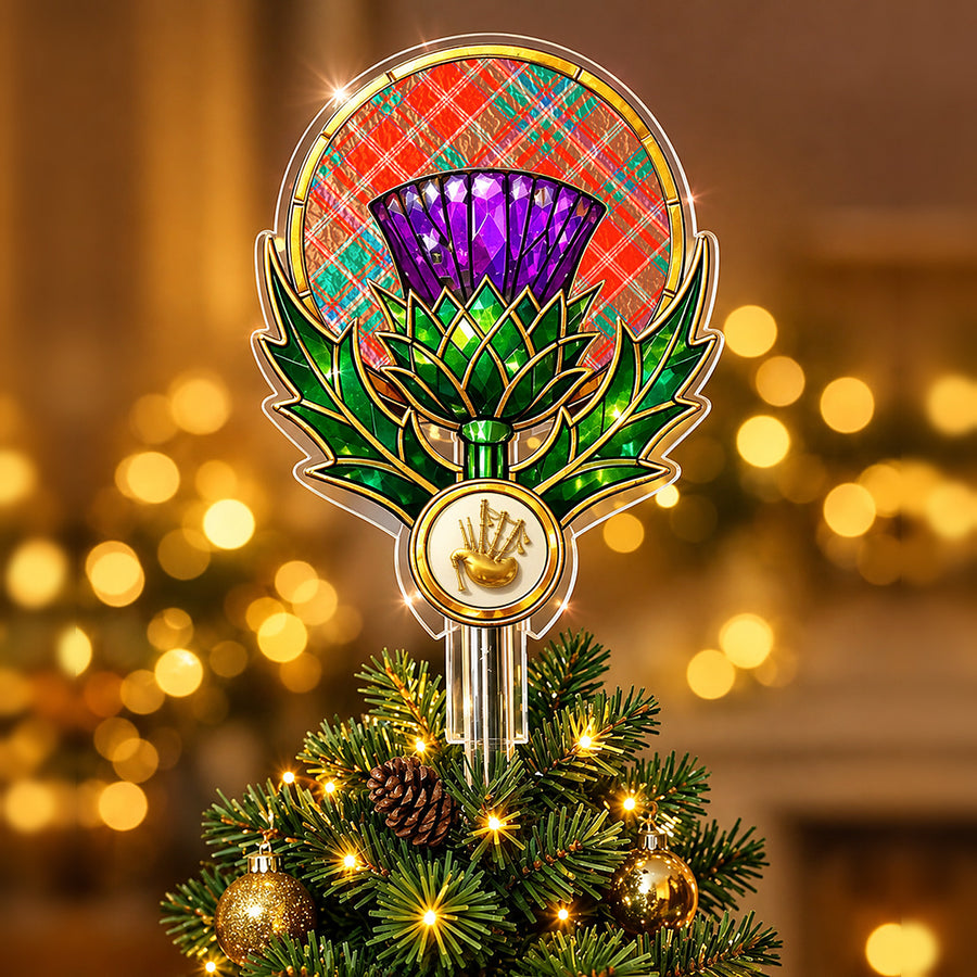 Stained-glass style thistle Christmas tree topper with a gold bagpipe emblem and the MacDougall Ancient tartan behind the thistle