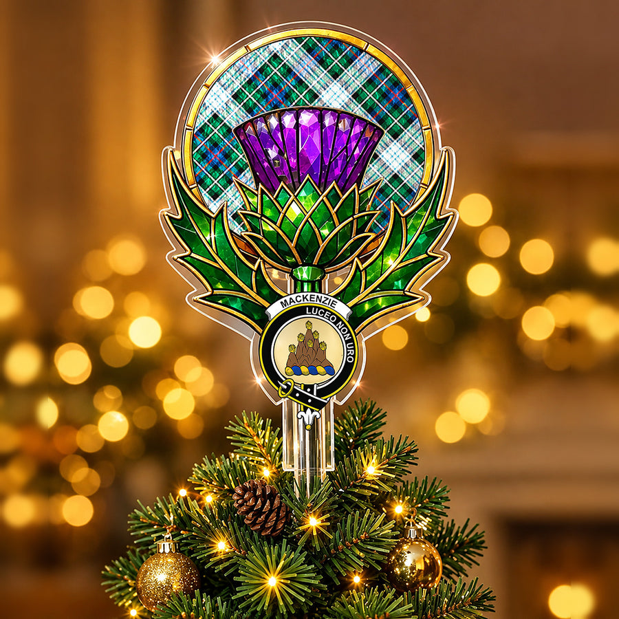 Clan MacKenzie crest in the centre of a stained-glass style thistle Christmas tree topper with the MacKenzie Dress Ancient tartan behind the thistle