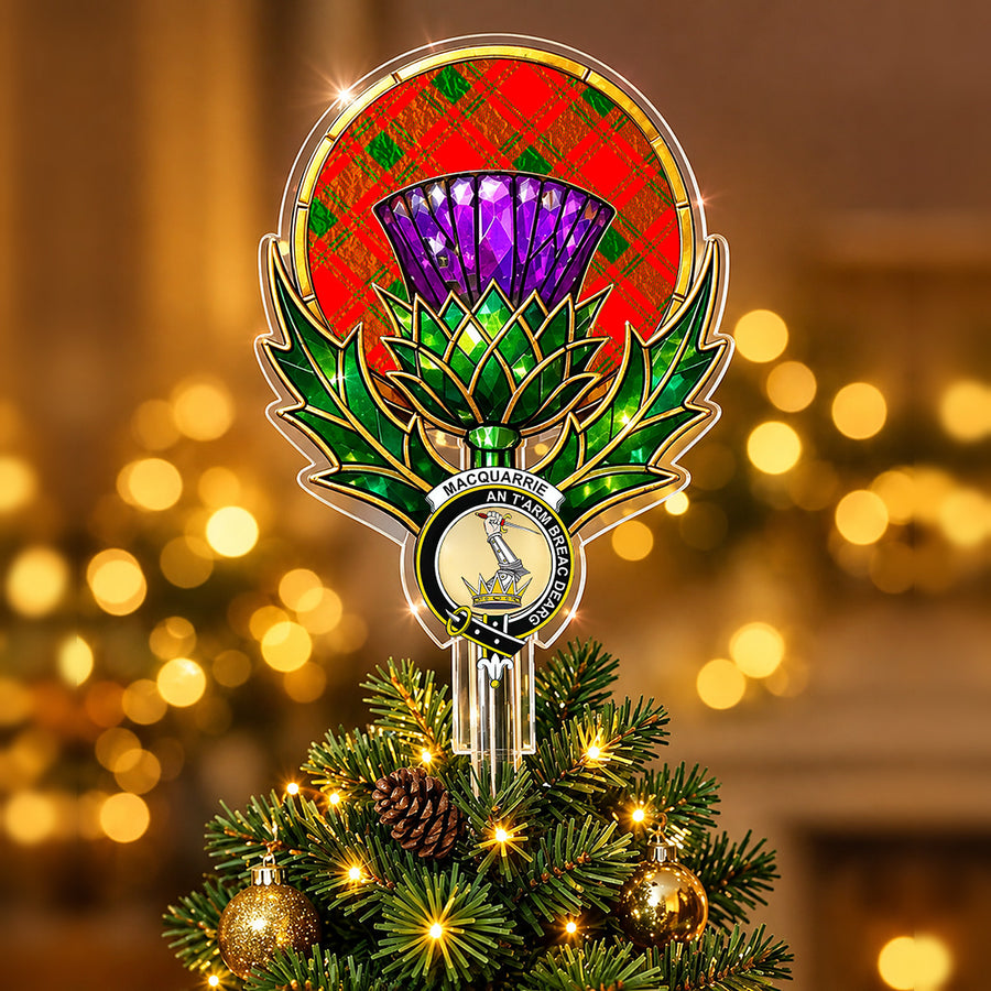 Clan MacQuarrie crest in the centre of a stained-glass style thistle Christmas tree topper with the MacQuarrie Modern tartan behind the thistle