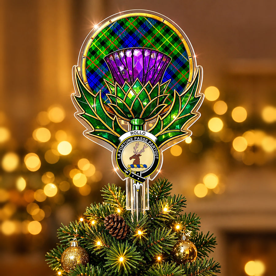 Clan Rollo crest in the centre of a stained-glass style thistle Christmas tree topper with the Rollo tartan behind the thistle