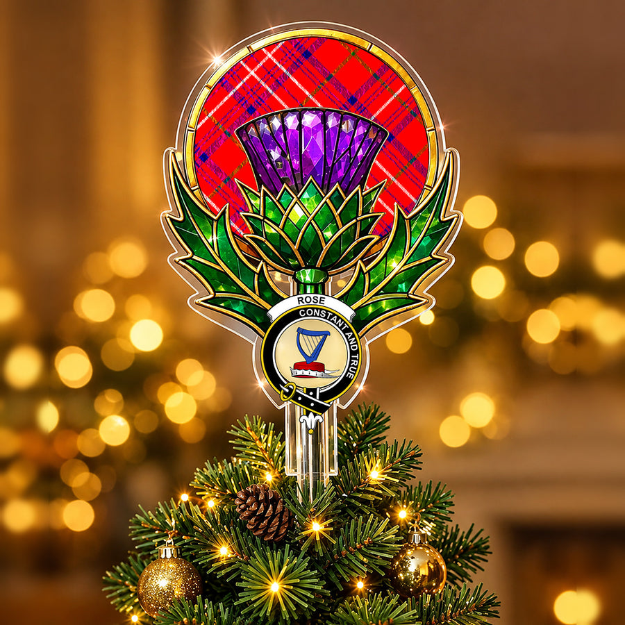 Clan Rose crest in the centre of a stained-glass style thistle Christmas tree topper with the Rose tartan behind the thistle
