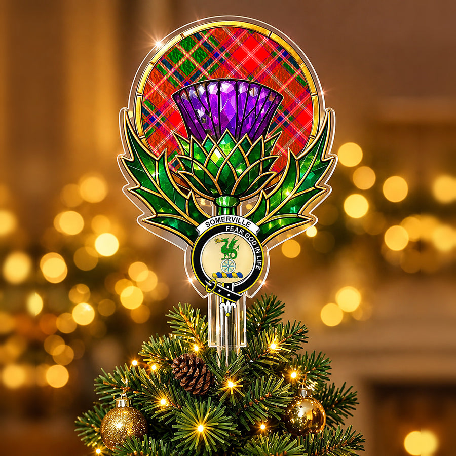 Clan Somerville crest in the centre of a stained-glass style thistle Christmas tree topper with the Somerville Modern tartan behind the thistle