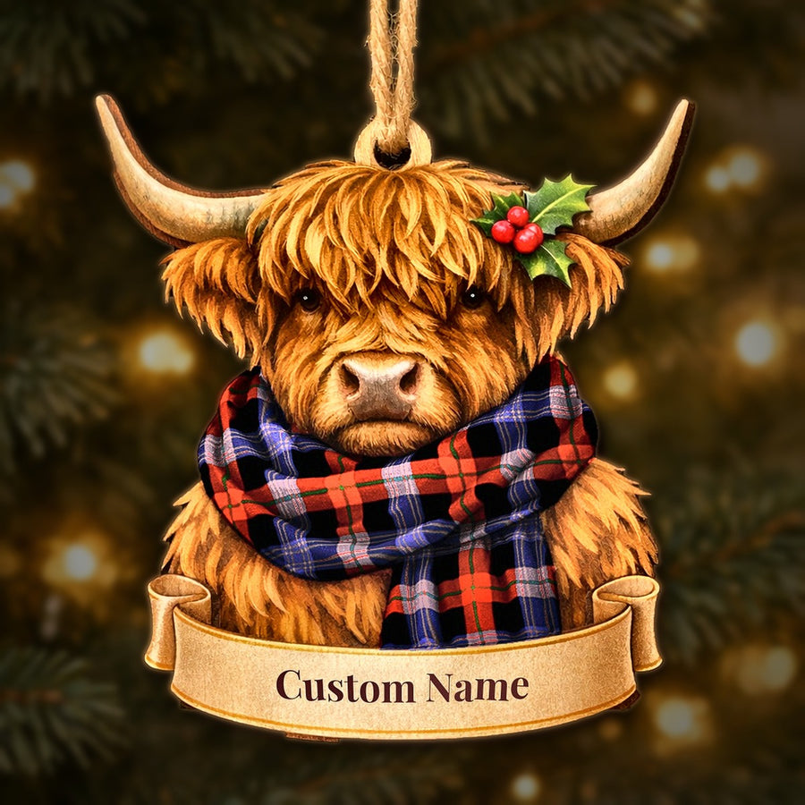 Wooden Highland cow Christmas ornament wearing a Brown Modern tartan scarf, with a ribbon banner for a custom name